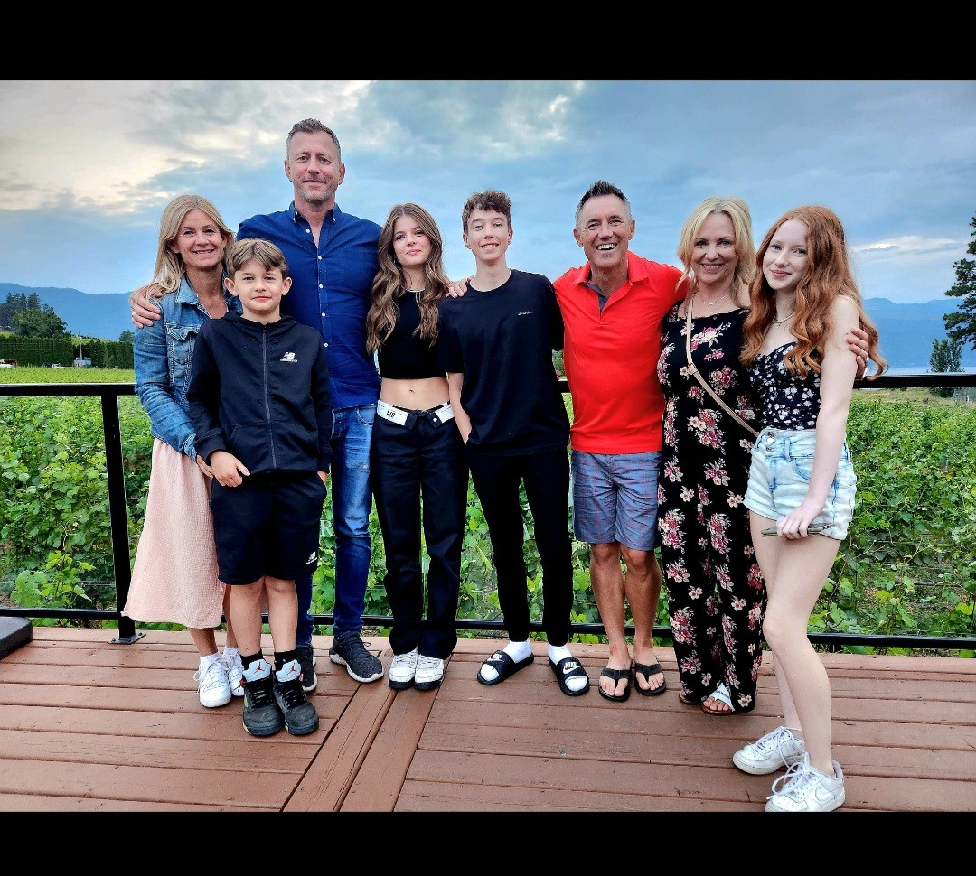 Host family and children on the right with the student's family from Germany on the left